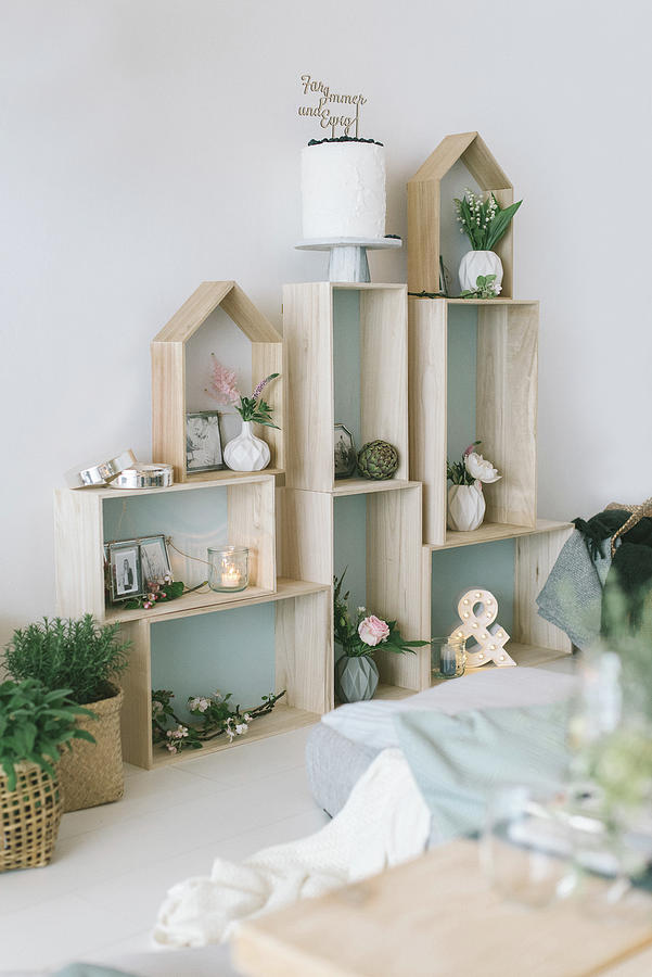 Festive Ornaments On Modular Shelves Made From Various Wooden Boxes Photograph by Katja Heil