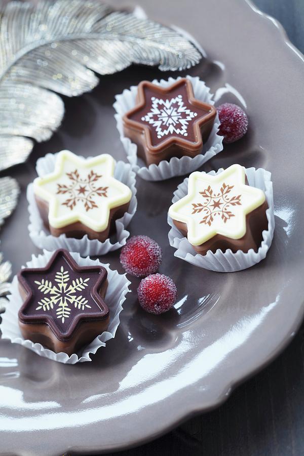 Festive, Star-shaped Chocolates Photograph by Franziska Taube