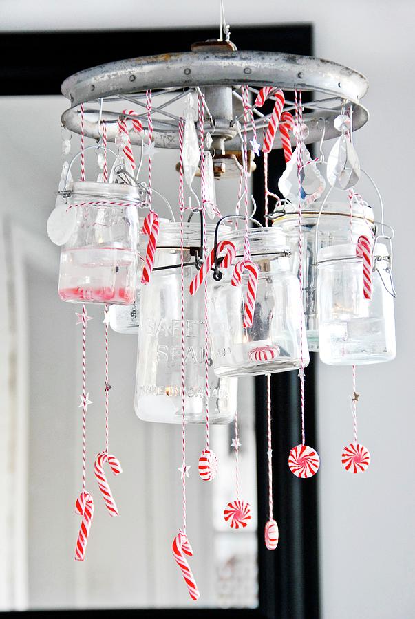 Festive Suspended Wreath Made From Old Wheel, Preserving Jars And Christmas Sweets Photograph by Sibylle Roessler