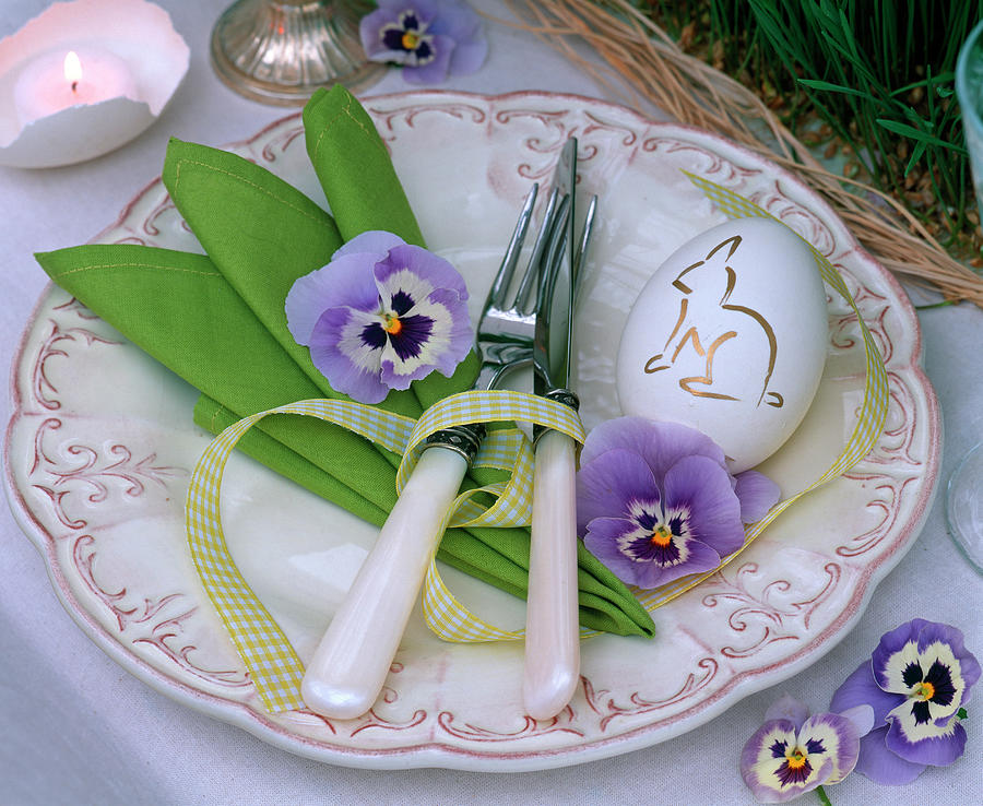 Festive Table Decoration With Grass Runner And Pansy Flowers Photograph by Friedrich Strauss