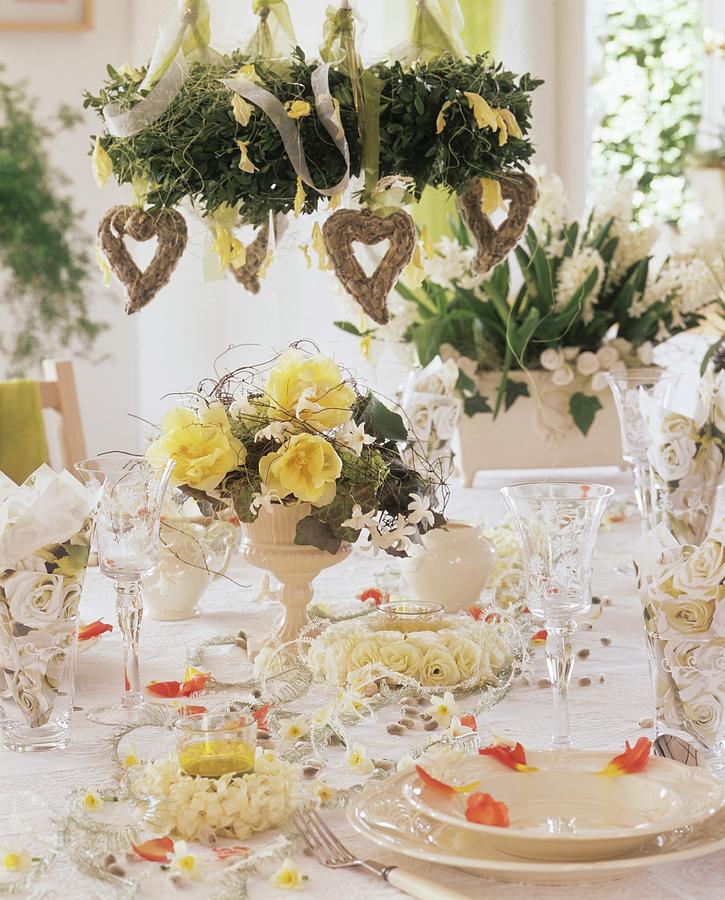 Festive Table With Flowers And Hanging Wreath Photograph by Strauss, Friedrich