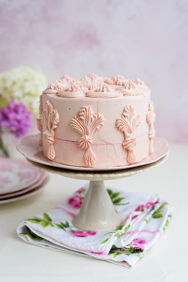 Festive Vanilla Cake With A Pink Fondant Glaze Photograph by Lucy Parissi