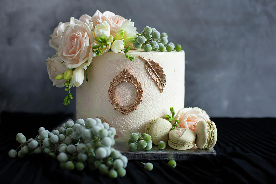 Festive White Wedding Cake Decorated With Flowers Photograph by Alicja Koll