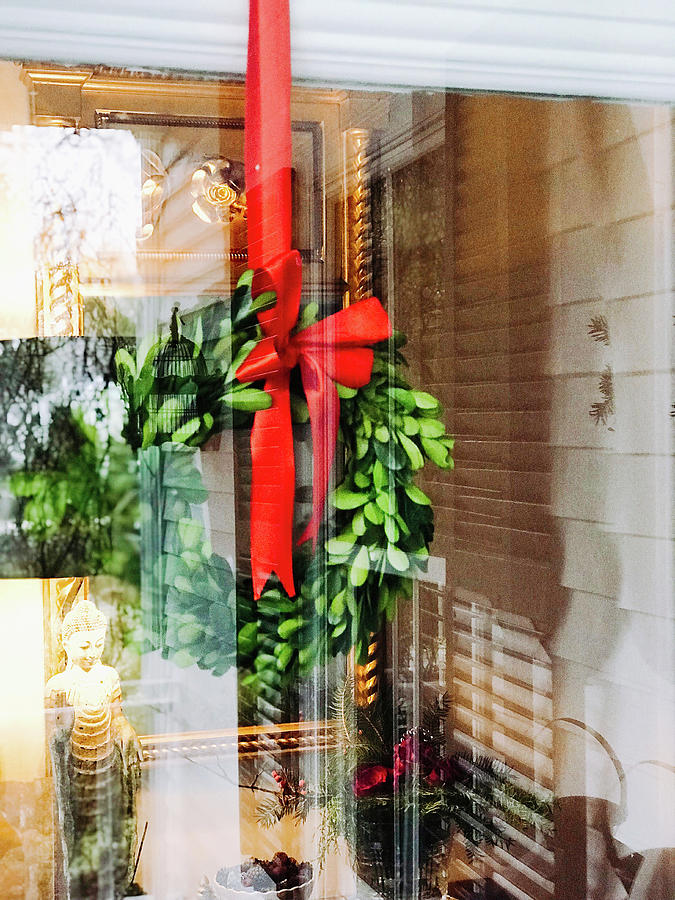 Festive Wreath With Red Ribbon Hung Behind Window Photograph by Eising Studio