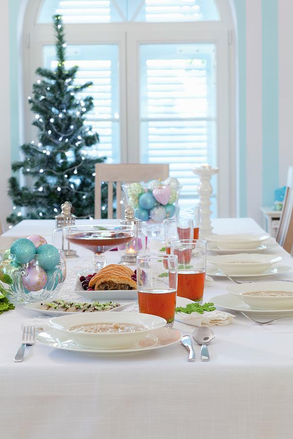 Festively Set Christmas Dining Table Photograph by Studio Lipov