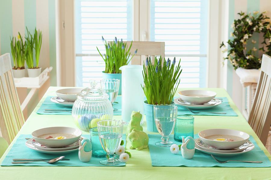 Festively Set Easter Table With Potted Grape Hyacinths Photograph by Studio Lipov