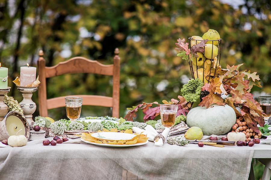 Festively Set Table In Autumnal Garden Photograph by Bildhbsch