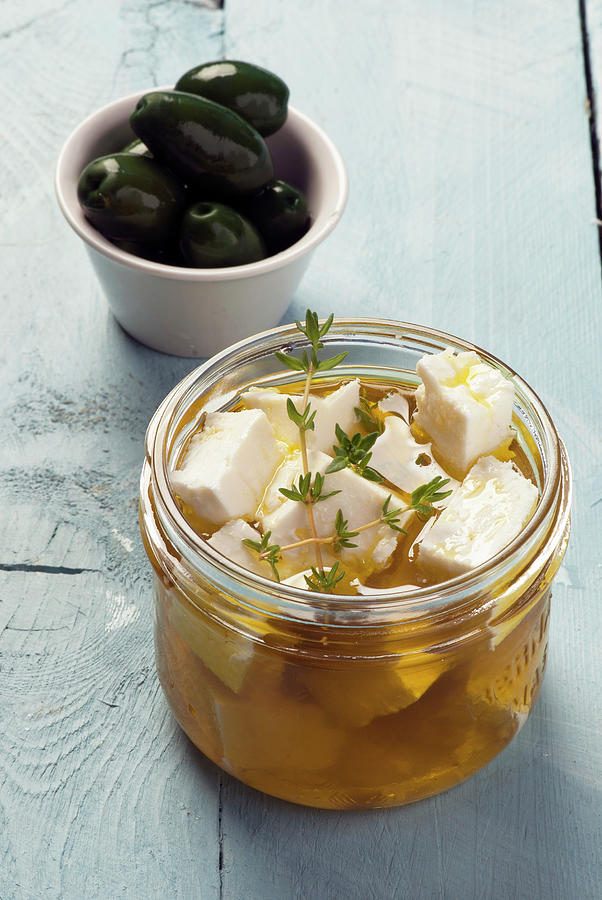 Feta Cheese Marinated In Olive Oil And Herbs Photograph by Spyros Bourboulis