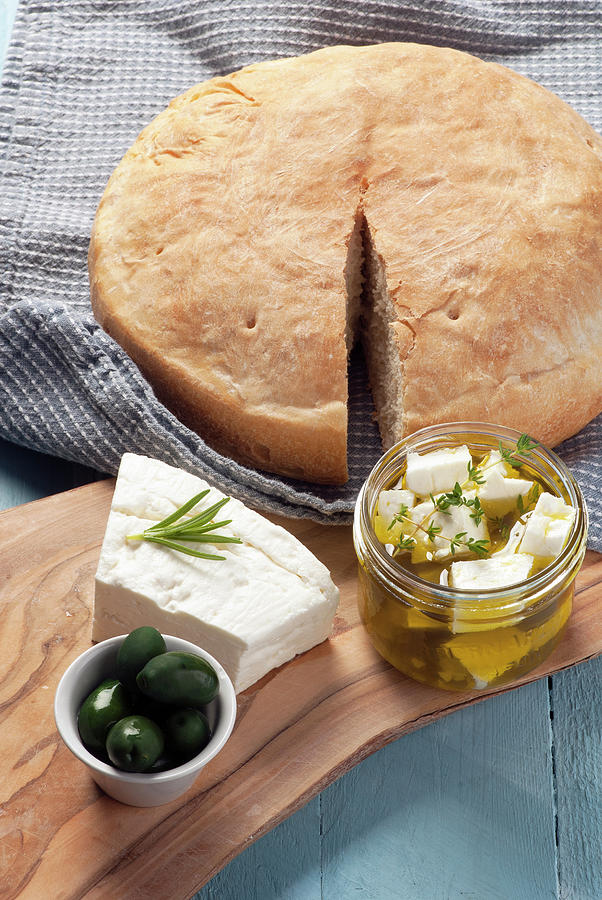 Feta Cheese Marinated In Olive Oil And Herbs With Pita Photograph by Spyros Bourboulis