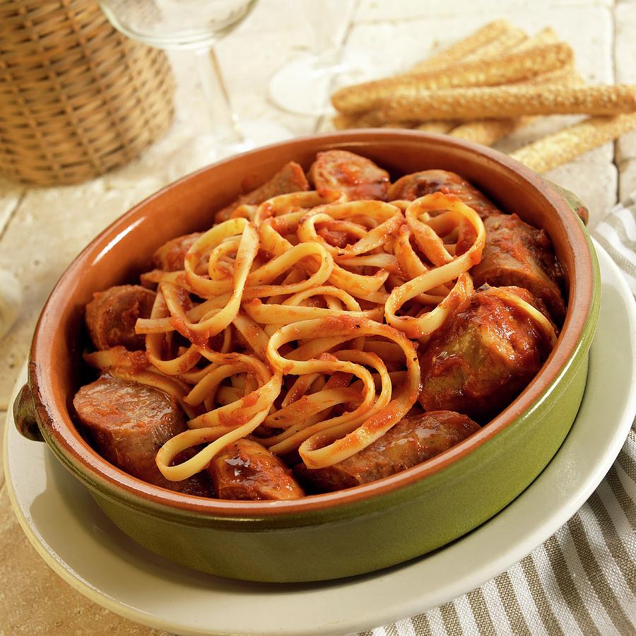 Fettuccine With Sausage With Marinara Sauce In A Ceramic Bowl Photograph by Paul Poplis