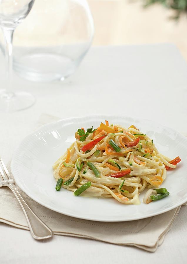 Fettuccini With Peppers, Carrots, Green Beans And Courgettes Photograph by Matteo Mezzadri