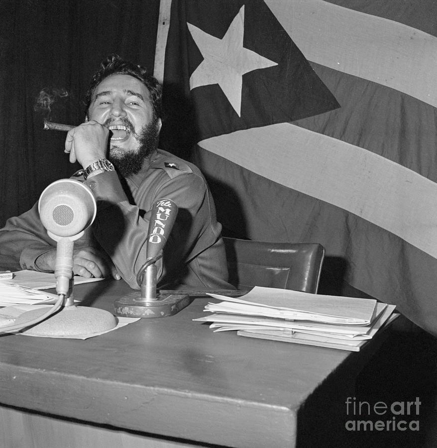 Fidel Castro With Cuban Flag Photograph by Bettmann
