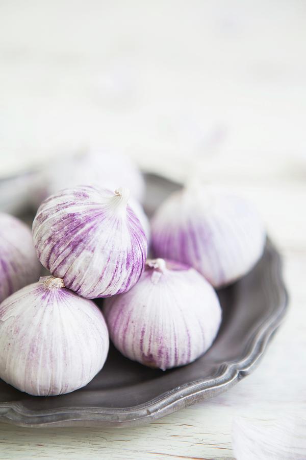 Field Garlic On A Pewter Plate On A Rustic, White Wooden Surface Photograph by Sabrina Sue Daniels