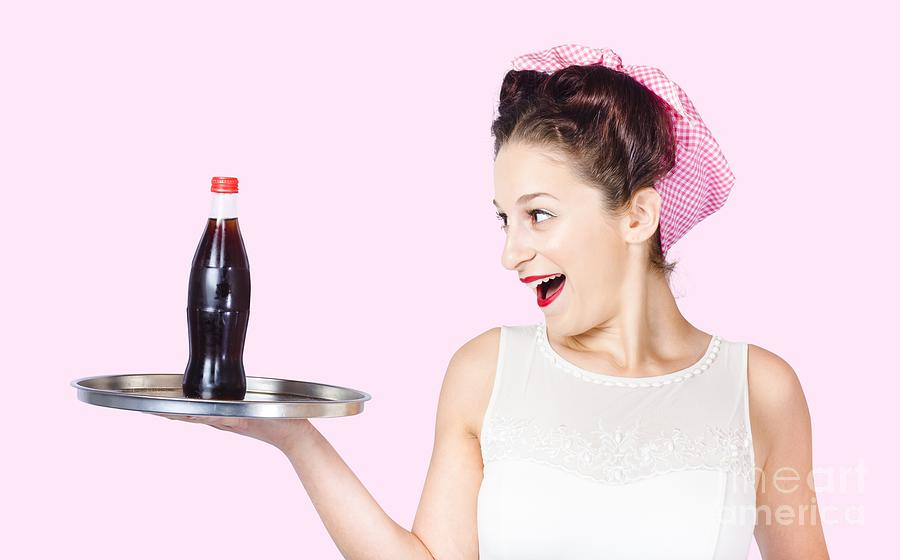 Fifties style female waiter serving up soda Photograph by Jorgo Photography