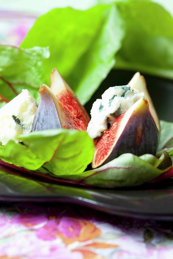 Fig Salad On Red Beet Leaves With Roquefort Photograph by Hilde Mche