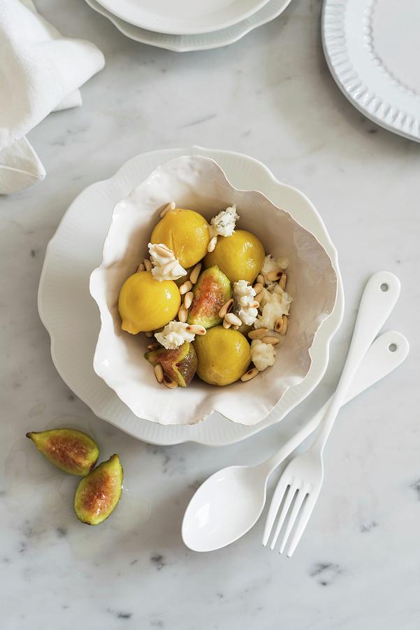 Fig Salad With Goats Cheese And Pine Nuts Photograph by Veronika Studer