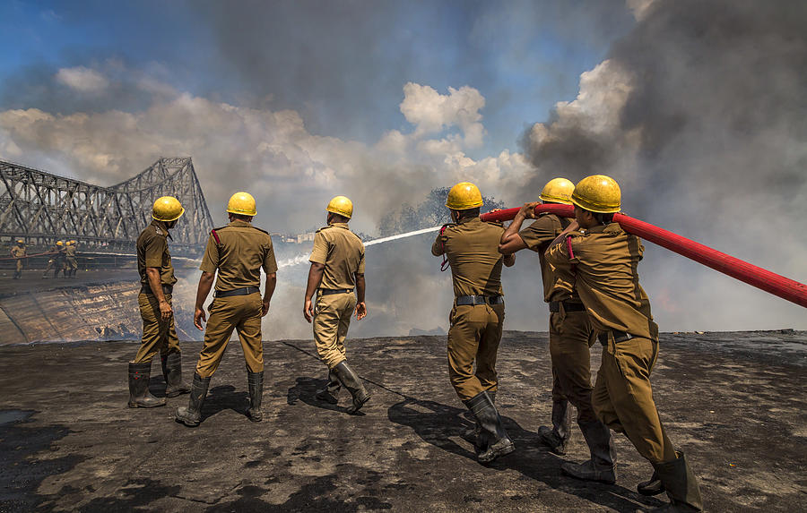 Pipe Photograph - Fighting The Fire by Souvik Banerjee