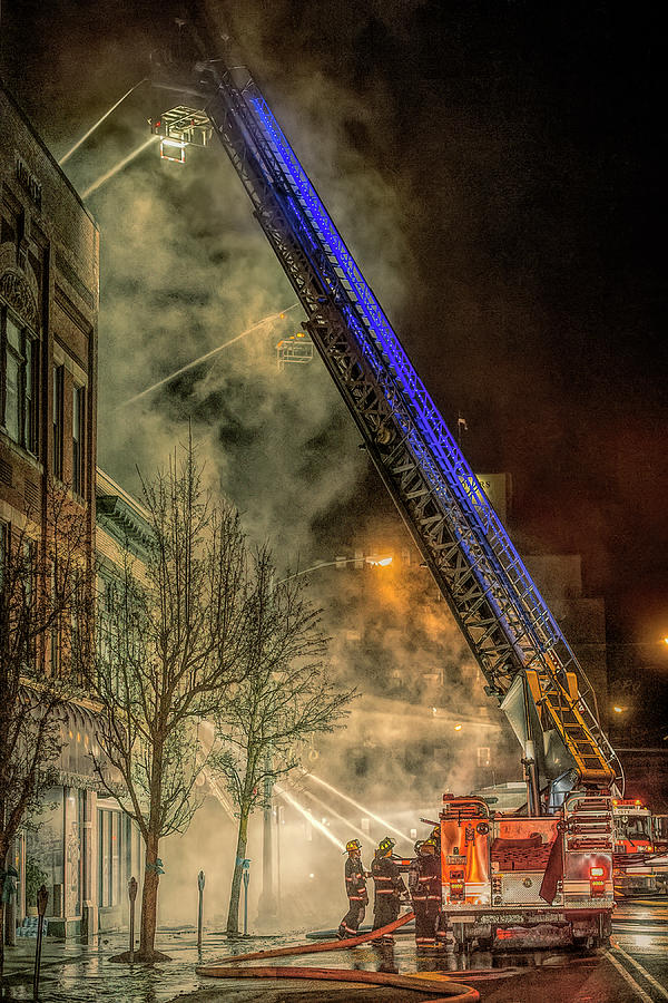 Fighting the Fire Photograph by Wade Aiken