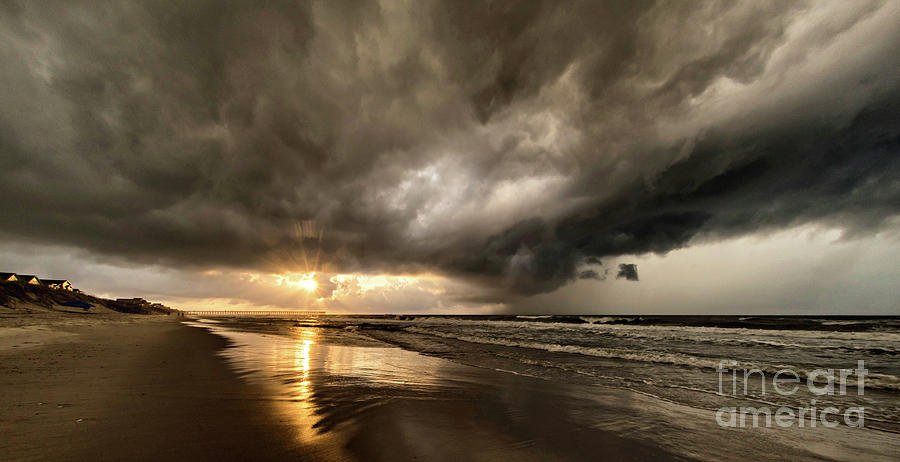 Fighting the Storm Clouds Photograph by DJA Images
