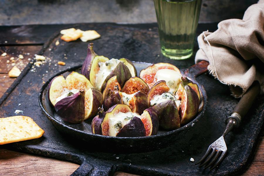 Figs Filled With Blue Cheese In An Old Pan Served With Crackers And A Glass Of White Wine Photograph by Natasha Breen