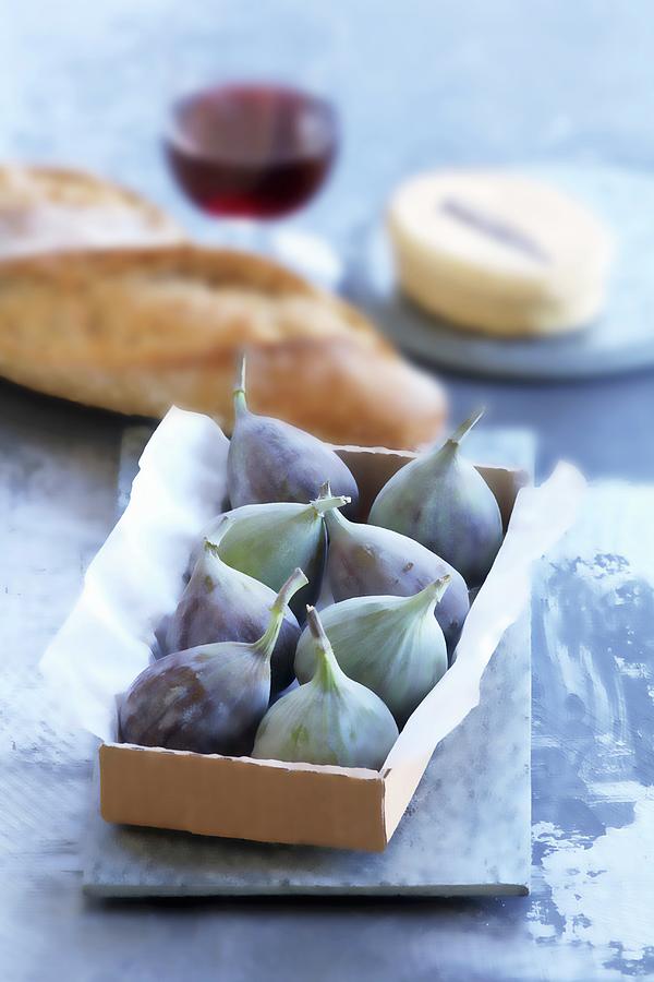 Figs In A Box, With Bread, Cheese And Wine In The Background Photograph by Raben, Sven C.