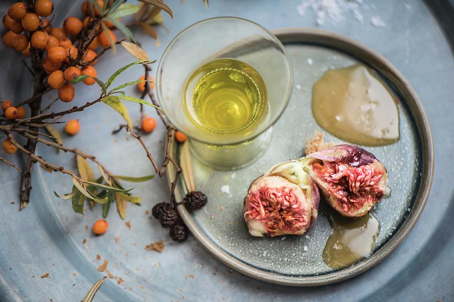 Figs With Sea Buckthorn Honey And A Glass Of Liqueur Photograph by Kris Jacobs Photography
