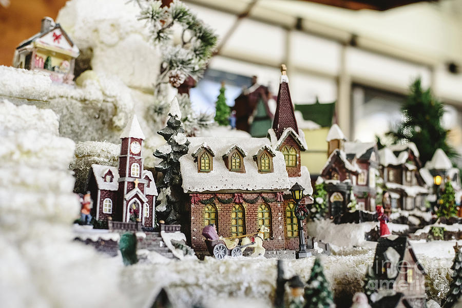 Figures and Christmas decorations in Nordic style, miniature houses with a snowy village. Photograph by Joaquin Corbalan