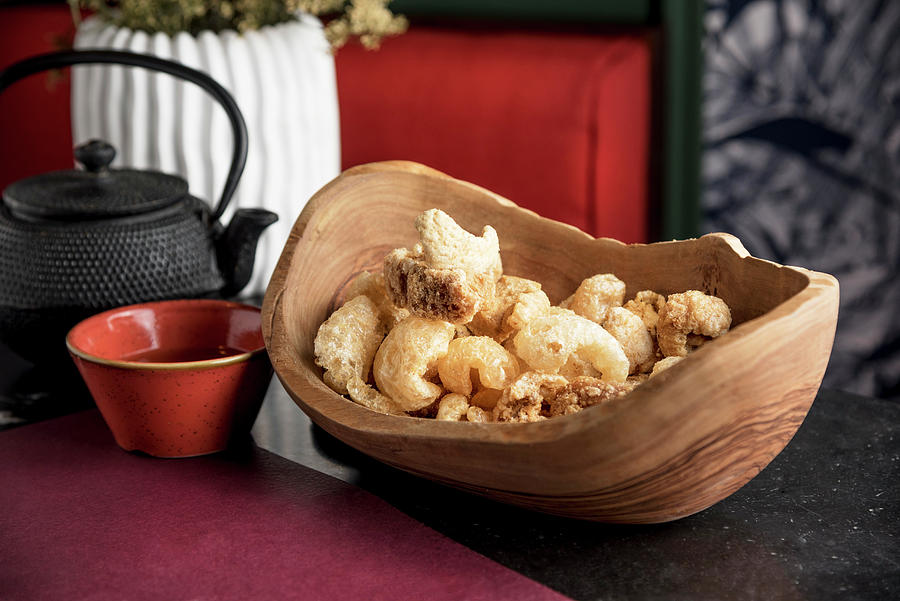 Filipino Style Pork Crackling Served With Coconut Vinegar Photograph by Daniel Ogulewicz