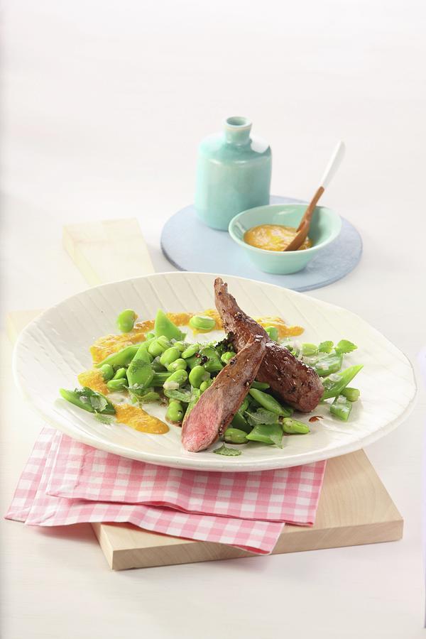 Fillet Of Hare On A Bean Medley With A Mustard Dip Photograph by Uwe Bender