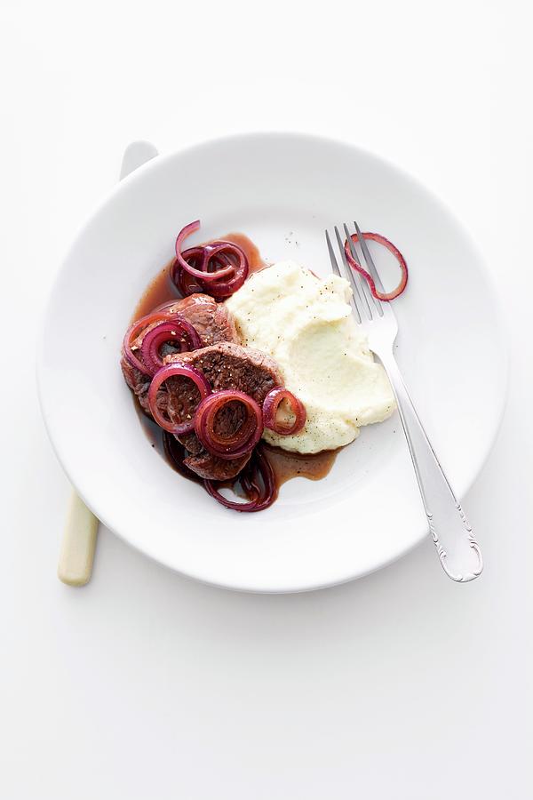 Fillet Steak With Red Wine Onions And Mashed Potato Photograph by Michael Wissing