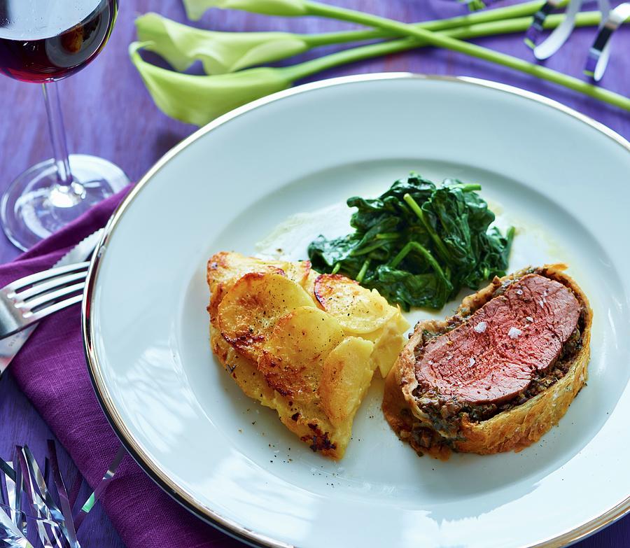 Fillet Wellington With A Warm Spinach Salad And Potato Gratin Photograph by Martin Dyrlv