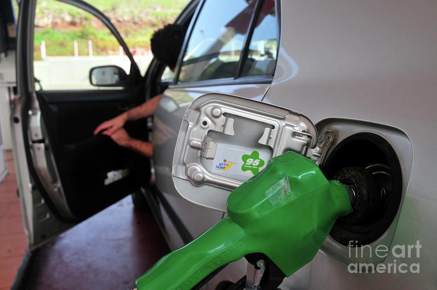 Filling Car Petrol Tank Photograph by Photostock-israel/science Photo Library