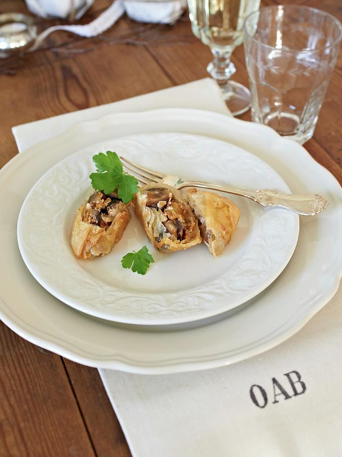 Filo Pastry Parcels With Aubergines Photograph by Hannah Kompanik