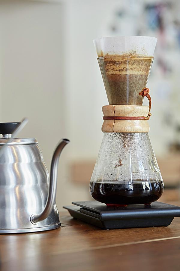 Filter Coffee Being Made With A Chemex Coffee Carafe Photograph by Herbert Lehmann