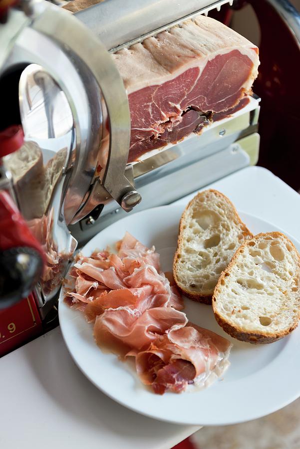 Finely Sliced Parma Ham With White Bread Photograph by Anthony Lanneretonne