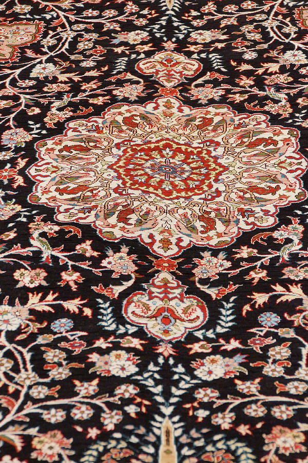 Finely woven silk carpet in a showroom Photograph by Steve Estvanik