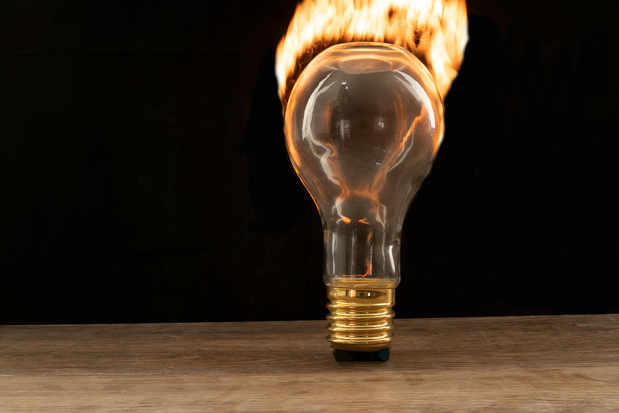 Fire and flames ignited out of light bulb by Vincent Billotto Fire and flames ignited out of light bulb by Vincent Billotto