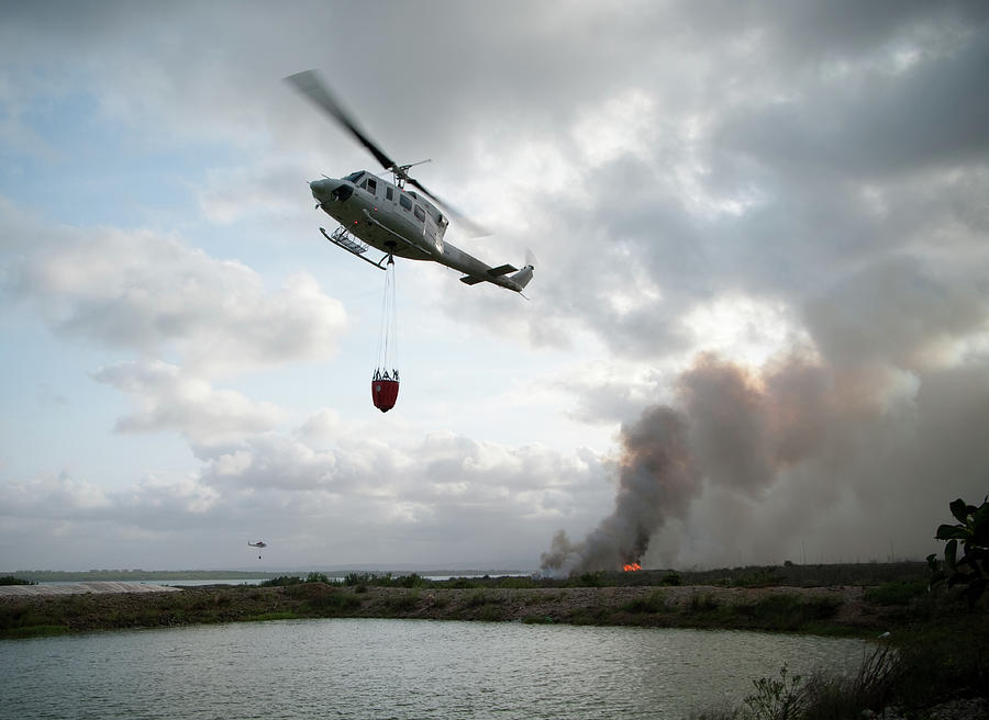 Fire Fighting Helicopter Approaches Photograph by Gavind