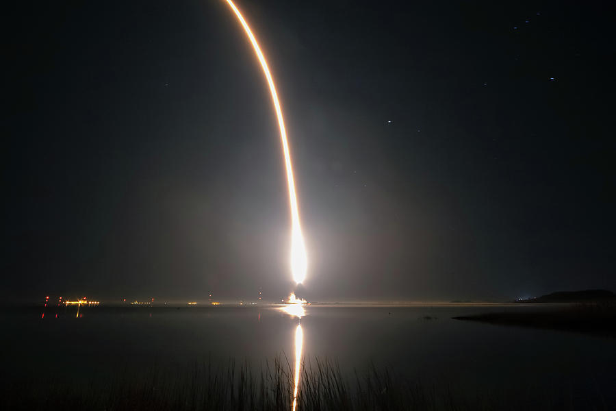 Fire Trail Of A Rocket Taking Off In A Night Sky Photograph by Dmitrii ...