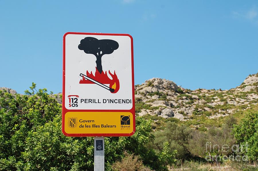Fire warning sign in Majorca Photograph by David Fowler