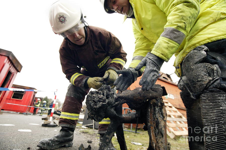Firefighters Examining Evidence Photograph by Michael Donne/science Photo Library