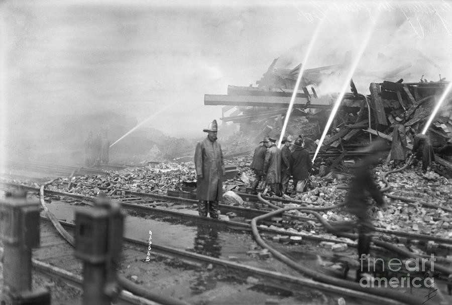 Firefighters Hose Ruins On Railroad Photograph by Bettmann