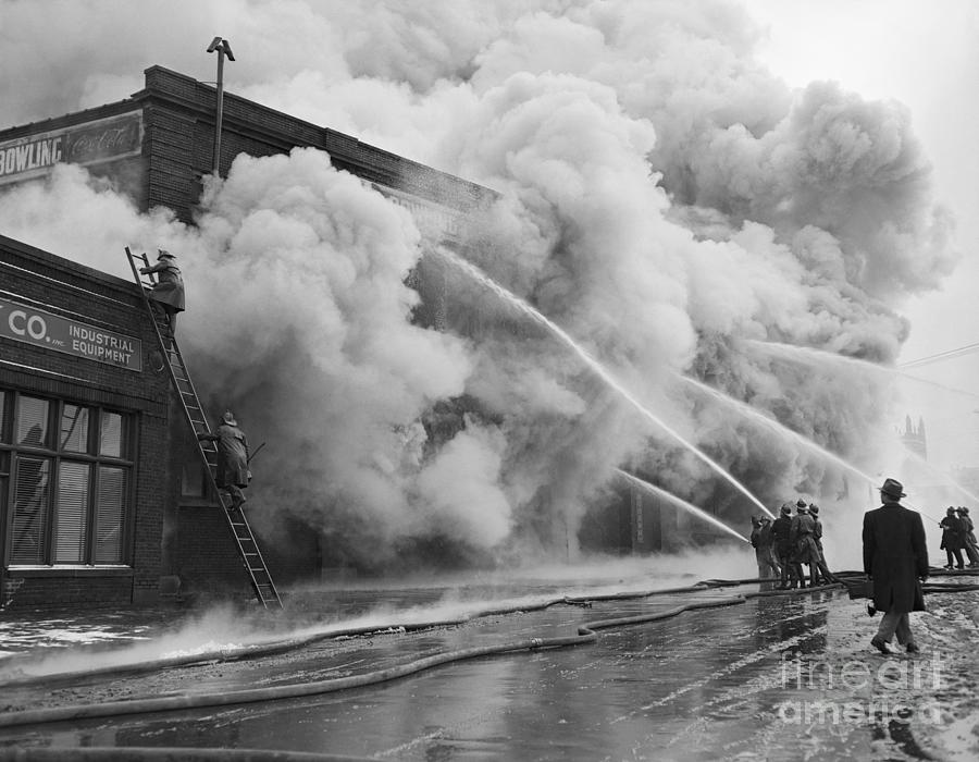 Firefighters Spraying Brick Building Photograph by Bettmann