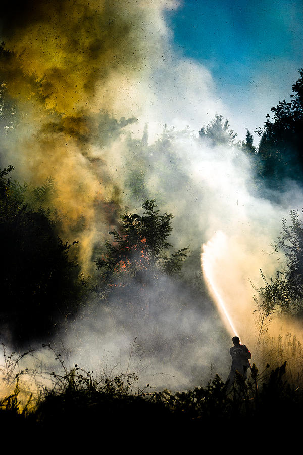 Fire Photograph - Fireman by Arda Adnan Kalkan