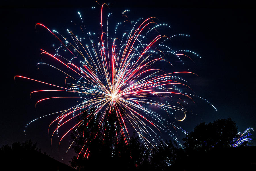 Fireworks and Moon Photograph by Allin Sorenson