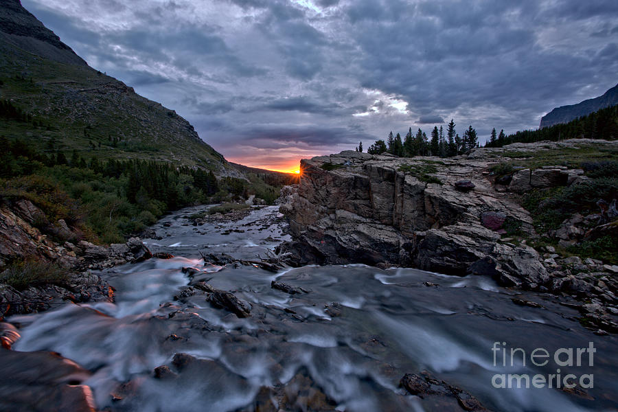 First Sunlight Over Swiftcurrent Falls Photograph by Adam Jewell