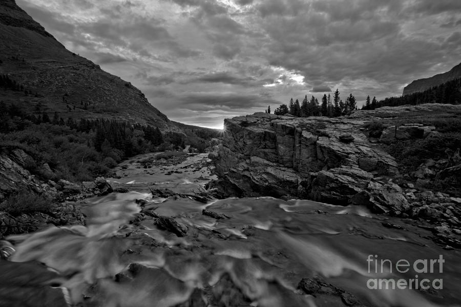First Sunlight Over Swiftcurrent Falls Black And White Photograph by Adam Jewell