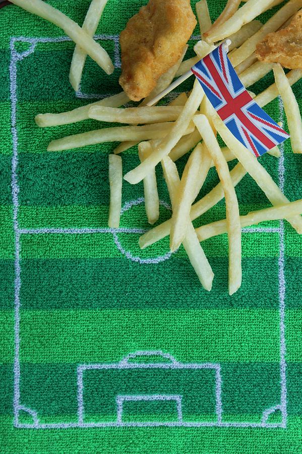 Fish And Chips england With A Paper Union Jack Flag And Football-themed Decoration Photograph by Schindler, Martina