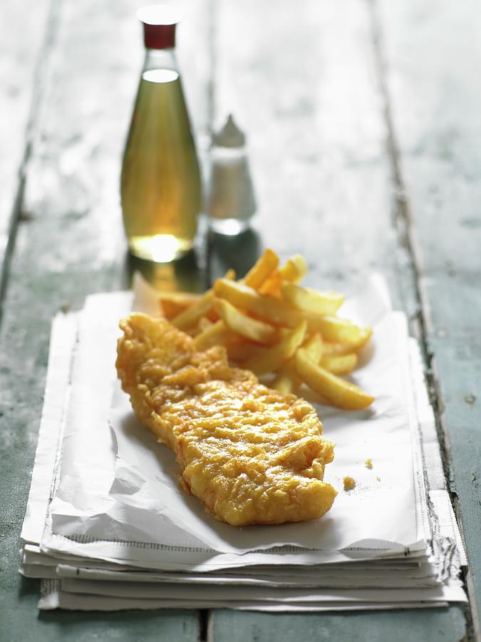 Fish And Chips On Newspaper With Salt And Vinegar Photograph by Atkinson / Sue Dr.