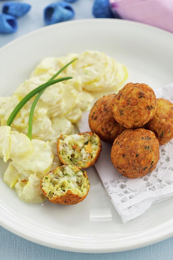 Fish Balls With A Mayonnaise And Potato Salad Photograph by Herbert Lehmann